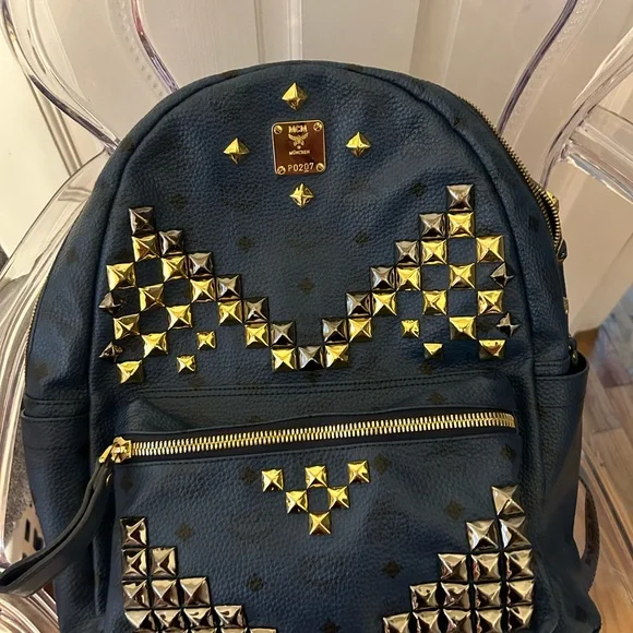 AUTHENTIC blue MCM Stark backpack with studs